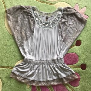 Unique embellished top